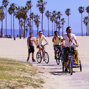 Cyclists and in-line skaters at Venice Beach.