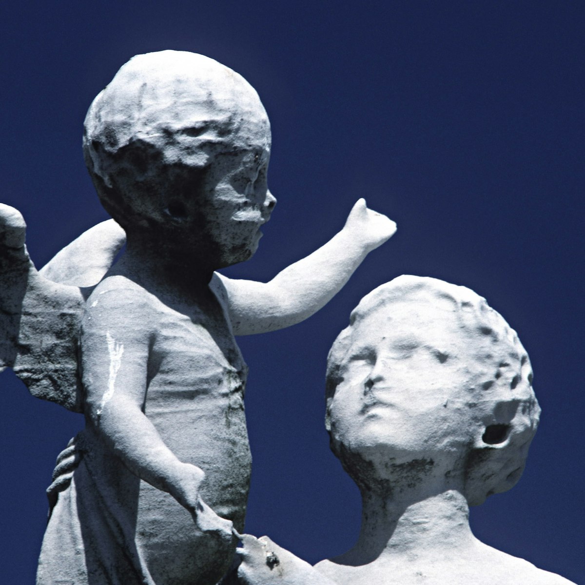 ACID RAIN DAMAGE TO STATUES. GREENWOOD CEMETERY. BROOKLYN, NY