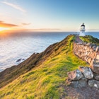 Cape Reinga Lighthouse at sunset.