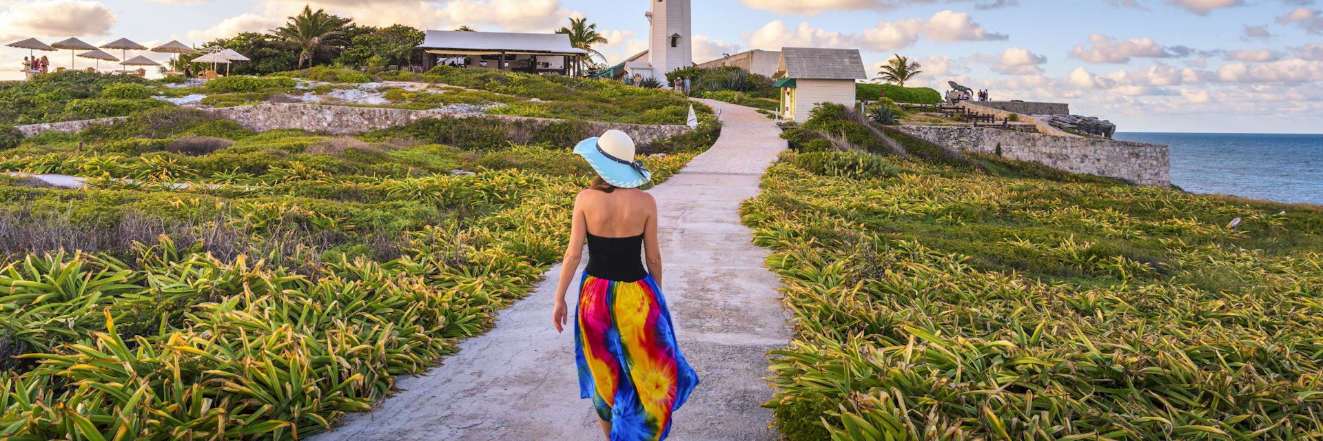 Woman walking in Punta Sur, Isla Mujeres, Mexico