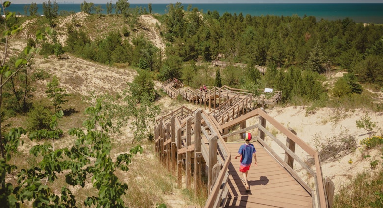 Boy hiking along dune succession trail in Indiana Dunes National Park.
1325469383
Boy hiking along dune succession trail in Indiana Dunes National Park