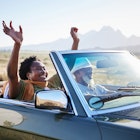 Mature African woman smiling with her hands raised in the air during a scenic road trip with her husband in their convertible
1387323834
Mature African woman smiling with her hands raised in the air during a scenic road trip with her husband in their convertible