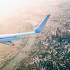 A view of central London from a commercial airliner, with the Thames, Tower Bridge and the towers of the City of London in view.
1450643258
Flying high over London - stock photo
A view of central London from a commercial airliner, with the Thames, Tower Bridge and the towers of the City of London in view.