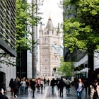 1500854679
Tower Bridge seen through facade of modern office buildings, London, UK.