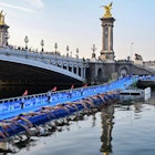 TOPSHOT - Triathlon athletes start to compete swimming in the Seine river next to the Alexandre III bridge during a Test Event for the women's triathlon for the upcoming 2024 Olympic Games in Paris, on August 17, 2023. From August 17 to 20, 2023, Paris 2024 is organising four triathlon events to test several arrangements, such as the sports operations, one year before the Paris 2024 Olympic and Paralympic Games. The swim familiarisation event follows the cancellation on August 6 of the pre-Olympics test swimming competition due to excessive pollution which forced organisers to cancel the pre-Olympics event. (Photo by Miguel MEDINA / AFP) (Photo by MIGUEL MEDINA/AFP via Getty Images)
1604064047
triathlon, Oly, Horizontal
Triathlon athletes start to compete swimming in the Seine river next to the Alexandre III bridge during a Test Event for the women's triathlon for the upcoming 2024 Olympic Games in Paris, on August 17, 2023. From August 17 to 20, 2023, Paris 2024 is organising four triathlon events to test several arrangements, such as the sports operations, one year before the Paris 2024 Olympic and Paralympic Games. The swim familiarisation event follows the cancellation on August 6 of the pre-Olympics test swimming competition due to excessive pollution which forced organisers to cancel the pre-Olympics event.