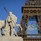 Olympic rings are seen on the Eiffel Tower near the restored statue of "Cavalier Arabe" (Arab rider) on the Pont d'Iena bridge in Paris on July 4, 2024, ahead of the upcoming Paris 2024 Olympic Games. (Photo by GEOFFROY VAN DER HASSELT / AFP) (Photo by GEOFFROY VAN DER HASSELT/AFP via Getty Images)
2159950810
topix, Oly, bestof, Horizontal, ESSENTIAL