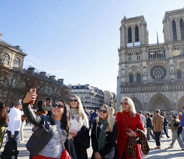 PARIS, FRANCE - OCTOBER 25: Tourists take a selfie with Notre-Dame de Paris Cathedral a few weeks before its reopening to the public scheduled for December 7, 2024 on October 25, 2024 in Paris, France. French ministers have floated the idea of â€‹â€‹charging tourists to enter the world-famous Notre Dame Cathedral in Paris when it opens on December 7 after five years of restoration. "All over Europe, people have to pay to enter the most remarkable religious buildings". French Culture Minister Rachida Dati told Le Figaro newspaper in an interview published Wednesday night. She said she had proposed "a symbolic tax for all tourist visits to Notre Dame, with the money going entirely towards a major plan to conserve religious heritage." (Photo by Chesnot/Getty Images)
PARIS, FRANCE - OCTOBER 25: Tourists take a selfie with Notre-Dame de Paris Cathedral a few weeks before its reopening to the public scheduled for December 7, 2024 on October 25, 2024 in Paris, France. French ministers have floated the idea of ​​charging tourists to enter the world-famous Notre Dame Cathedral in Paris when it opens on December 7 after five years of restoration. "All over Europe, people have to pay to enter the most remarkable religious buildings". French Culture Minister Rachida Dati told Le Figaro newspaper in an interview published Wednesday night. She said she had proposed "a symbolic tax for all tourist visits to Notre Dame, with the money going entirely towards a major plan to conserve religious heritage." (Photo by Chesnot/Getty Images)
2180989666
bestof, topix