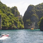 The Phi Phi Islands are popular tourist islands in Krabi, Thailand.
520990988
idyllic:CB2, coastline:CB2, island:CB2, vacation:CB2, sea:CB2, tour boat:CB2, daytime:CB2, summer:CB2, tropical:CB2, outdoors:CB2, transportation:CB2, incidental people:CB2, leisure:CB2, people:CB2, speedboat:CB2, Koh Phi Phi:CB2, travel & tourism:CB2
Phi Phi Islands, Krabi, Thailand - stock photo
The Phi Phi Islands are popular tourist islands in Krabi, Thailand.