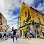 Traditional folk dancer dancing in Galway village centre