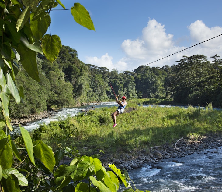 Starting from a high point in the jungle canopy a tourist zips over the Sarapiqui River in Costa Rica.  Zip lining has become one of the most popular tourist activities in Costa Rica.
904577310
kwneeded
Costa Rica, Zip Line, Sarapiqui River, - stock photo
Starting from a high point in the jungle canopy a tourist zips over the Sarapiqui River in Costa Rica. Zip lining has become one of the most popular tourist activities in Costa Rica.