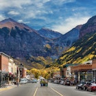 A look down Main Street in Telluride during Peak Autumn Color from the Aspens with a mountain backdrop
508568122
Getty,  RFC,  Autumn,  Canyon,  Colorado,  Day,  Environment,  Horizontal,  Landscape,  Majestic,  Mountain,  Nature,  Outdoors,  Photograph,  Photography,  Remote,  Season,  Telluride,  Town,  Tranquility,  Travel,  USA,  Beauty In Nature,  Building Exterior,  Business Finance and Industry,  City Street,  Cloud - Sky,  Color Image,  Incidental People,  Mining - Natural Resources,  Multi Colored,  Rocky Mountains,  San Juan Mountains,  Scenics - Nature,  Small Town America,  Tranquil Scene,  Travel Destinations,  Bench,  Bicycle,  Car,  City,  Cityscape,  Flag,  Neighborhood,  Person,  Plant,  Road,  Street,  Urban,  Vehicle
Autumn; Beauty In Nature; Building Exterior; Business Finance and Industry; Canyon; City Street; Cloud - Sky; Color Image; Colorado; Day; Environment; Horizontal; Incidental People; Landscape; Majestic; Mining - Natural Resources; Mountain; Multi Colored; Nature; Outdoors; Photograph; Photography; Remote; Rocky Mountains; San Juan Mountains; Scenics - Nature; Season; Small Town America; Telluride; Town; Tranquil Scene; Tranquility; Travel; Travel Destinations; USA;
A look down Main Street in Telluride during Peak Autumn Color from the Aspens with a mountain backdrop