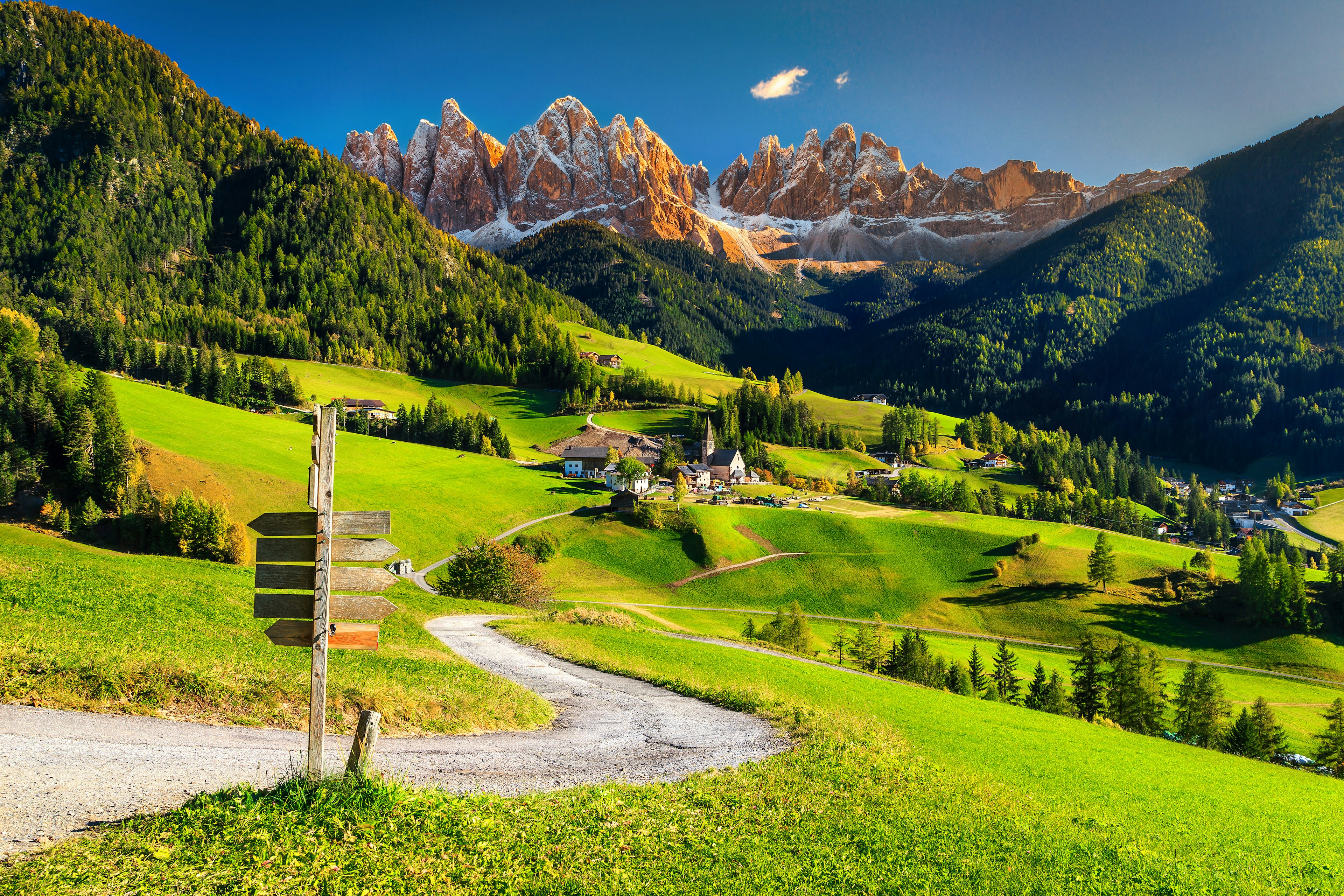 It takes time to explore the winding backroads through the Dolomites. Getty Images