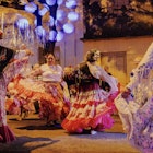 ASUNCION, PARAGUAY, AUGUST, 2024. Traditional Paraguayan dancers known as "galoperas" perform at a musical and cultural event in the historic La Chacarita neighborhood in Asunción, Paraguay. María Magdalena Arréllaga for Lonely Planet.Adult,  Bride,  Clothing,  Dance Pose,  Dancing,  Female,  Footwear,  Leisure Activities,  People,  Person,  Shoe,  Wedding,  Woman.ASUNCION, PARAGUAY, AUGUST, 2024. Traditional Paraguayan dancers known as "galoperas" perform at a musical and cultural event in the historic La Chacarita
Adult,  Bride,  Clothing,  Dancing,  Female,  Footwear,  People,  Person,  Shoe,  Wedding,  Woman,  Dance Pose,  Leisure Activities,  Adult,  Bride,  Dancing,  Female,  People,  Person,  Woman
ASUNCION, PARAGUAY, AUGUST, 2024. Traditional Paraguayan dancers known as "galoperas" perform at a musical and cultural event in the historic La Chacarita neighborhood in Asunción, Paraguay. María Magdalena Arréllaga for Lonely Planet