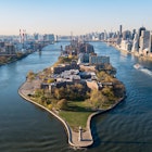 Roosevelt Island, New York - 6 November 2019: An aerial shot of Lighthouse Park on Roosevelt Island and the amazing skyscrapers in New York City, License Type: media, Download Time: 2024-09-01T17:00:57.000Z, User: pinkjozie64, Editorial: true, purchase_order: 56530, job: Global Publishing WIP, client: Experience New York 2, other: Jo-anne Riddell