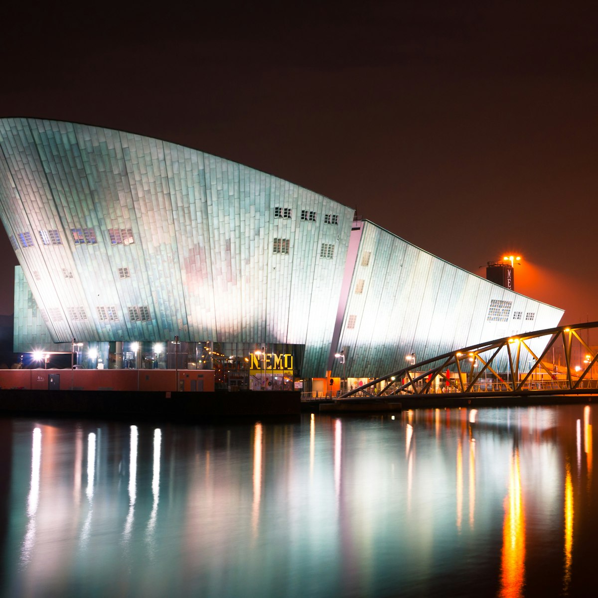 AMSTERDAM, NETHERLANDS - JULY 27: The Nemo Museum at night on July 27, 2013 in Amsterdam, Netherlands. Science Center NEMO is designed by Renzo Piano since 1997.; Shutterstock ID 162619127; Your name (First / Last): Josh Vogel; Project no. or GL code: 56530; Network activity no. or Cost Centre: Online-Design; Product or Project: 65050/7529/Josh Vogel/LP.com Destination Galleries