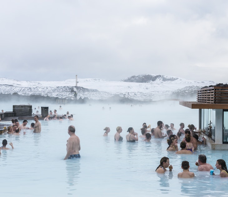 Blue lagoon, Iceland - February 20, 2016: People in SPA  are drinking cocktails near  a cafe in the swiming pool, Blue lagoon - a geothermal bath resort in the south of Iceland, in winter.
amazing, bath, bathing, blue, cafe, care, cocktail, documentary, editorial, geology, geothermal, girl, happy, health, holiday, hot, iceland, icelandic, lagoon, lake, lava, lifestyle, minerals, mud, nordic, people, pool, recreation, relaxing, resort, sightseeing, skin, skincare, spa, spring, therapy, thermal, tourism, tourist, travel, treatment, vacation, volcanic, volcanism, volcano, warm, water, wellness, winter, woman