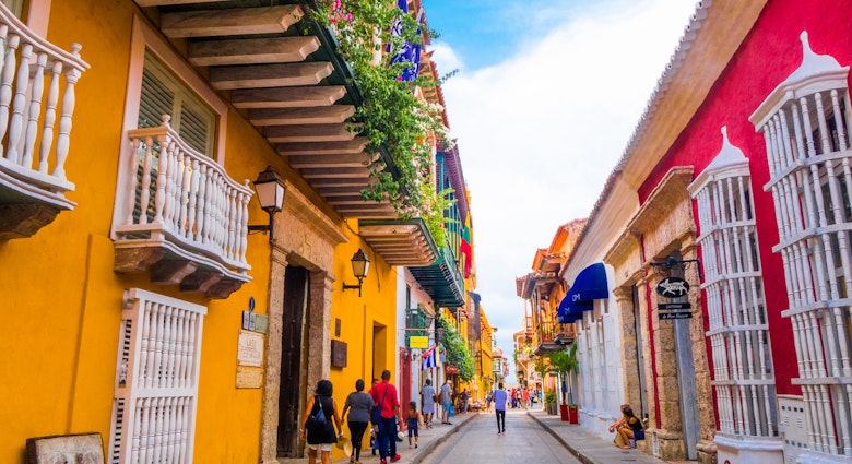 October 22, 2017: Colourful facades on a narrow street in Cartagena.
774200002
architecture, balcony, blue, bright, building, buildings, cartagena, city, colombia, color, colorful, downtown, empty, exterior, flowers, historic, history, house, houses, lamp, old, orange, outdoor, pathway, promenade, sea, seaside, shadow, sky, south, street, sun, sunset, terraces, tourist, town, trees, tropical, urban, vacation, view, vintage, walled, windows, wood, yellow