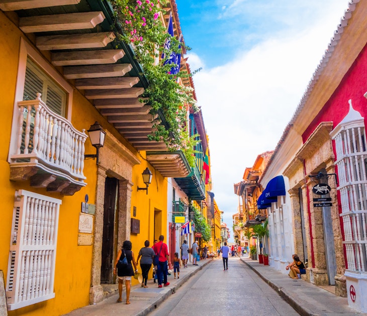 October 22, 2017: Colourful facades on a narrow street in Cartagena.
774200002
architecture, balcony, blue, bright, building, buildings, cartagena, city, colombia, color, colorful, downtown, empty, exterior, flowers, historic, history, house, houses, lamp, old, orange, outdoor, pathway, promenade, sea, seaside, shadow, sky, south, street, sun, sunset, terraces, tourist, town, trees, tropical, urban, vacation, view, vintage, walled, windows, wood, yellow