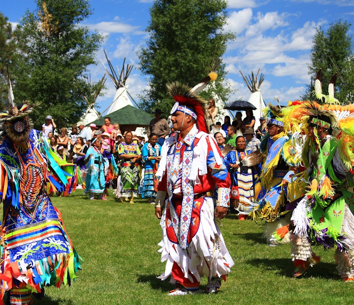 CHEYENNE, WYOMING - July 25, 2015 - Native American performers in costume and dancing at a pow-wow; Shutterstock ID 306699764; your: Brian Healy; gl: 65050; netsuite: Lonely Planet Online Editorial; full: Top things to do in Wyoming